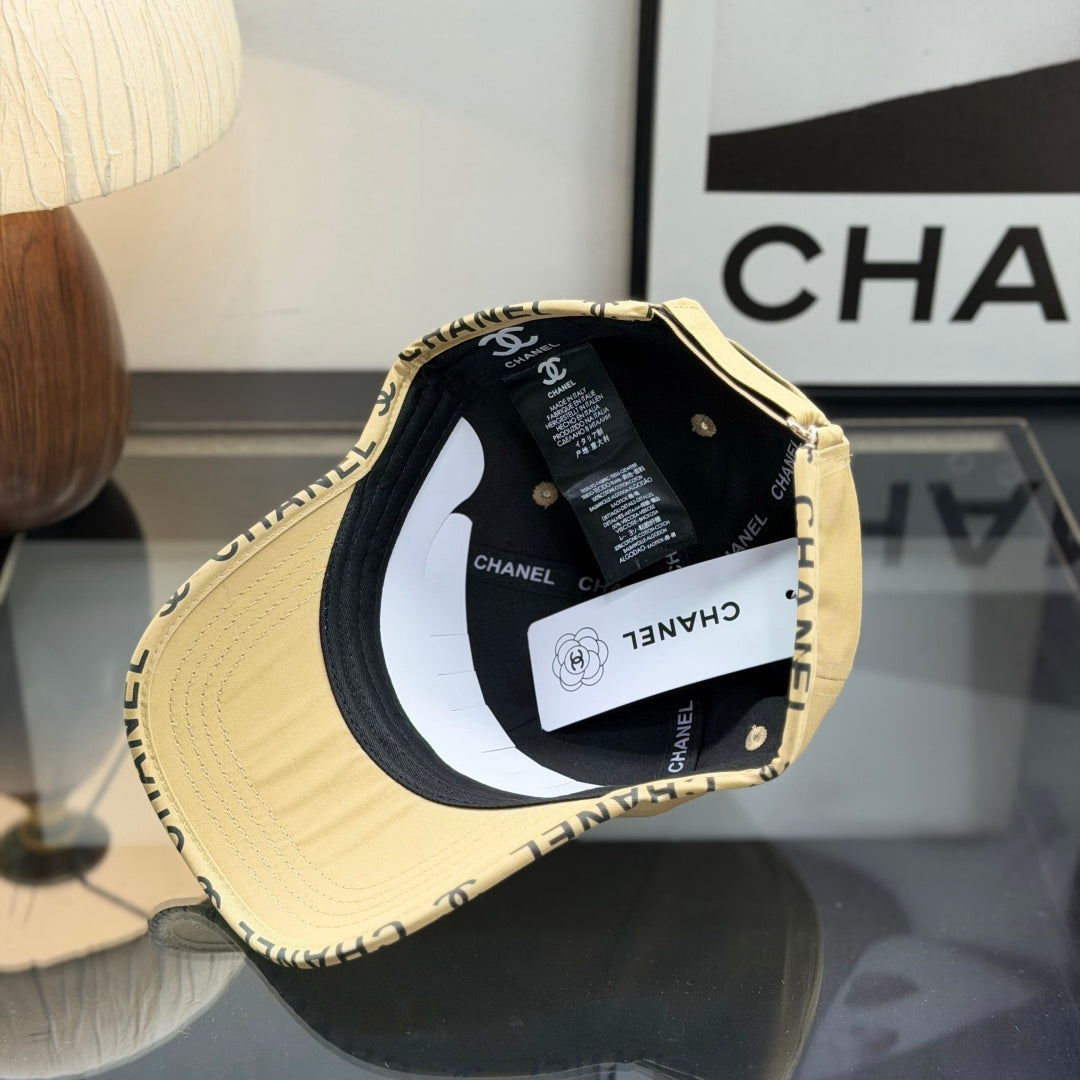 A premium structured baseball cap in a neutral beige tone featuring an embroidered central logo.