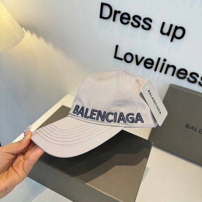 A grey cotton baseball cap with embroidered lettering, featuring a curved brim and adjustable back.