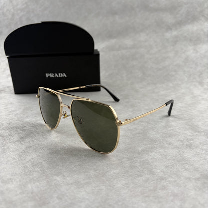 Classic gold-tone metal aviator sunglasses with tinted lenses, resting next to a protective case.