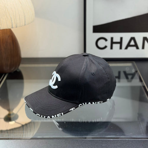 A classic black baseball cap featuring white embroidered logo, sturdy cotton blend, adjustable strap