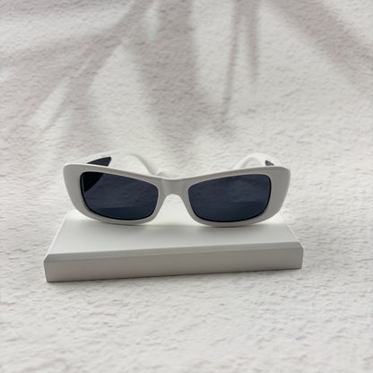 A pair of modern rectangular sunglasses with a bright white frame and dark tinted lenses.