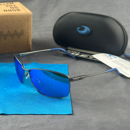 Close-up of performance polarized sunglasses with blue mirror lenses and lightweight metal frame.