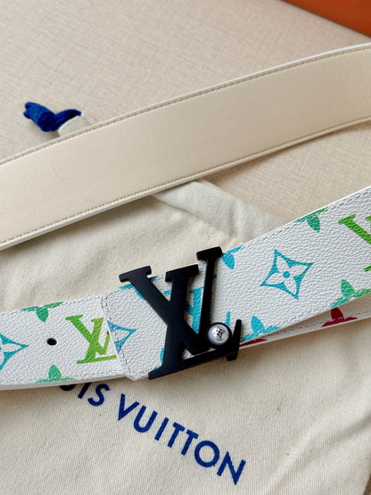 Multicolor monogram canvas belt with a black signature buckle and smooth leather backing.