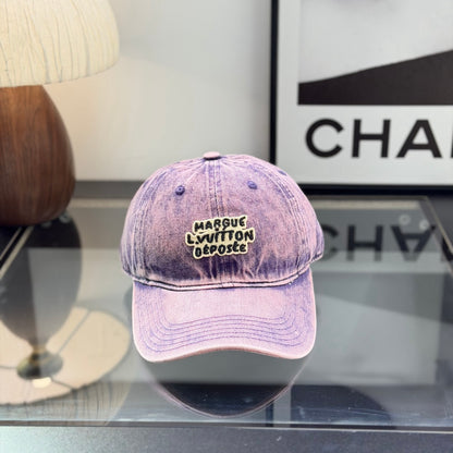 Distressed purple washed denim baseball cap with front embroidery patch, adjustable strap back.