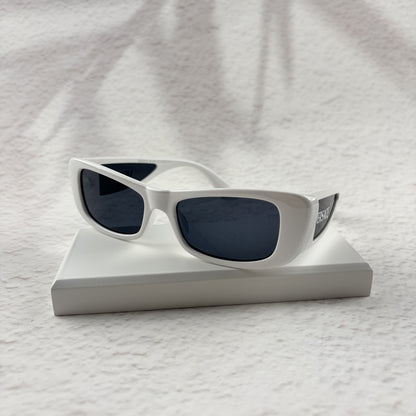 A pair of modern rectangular sunglasses with a bright white frame and dark tinted lenses.