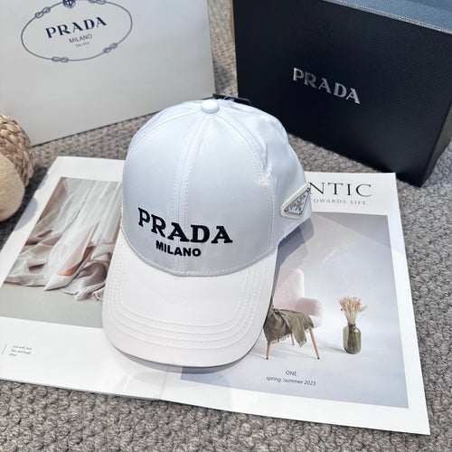 A clean white baseball cap featuring black embroidered lettering, structured crown, and curved visor