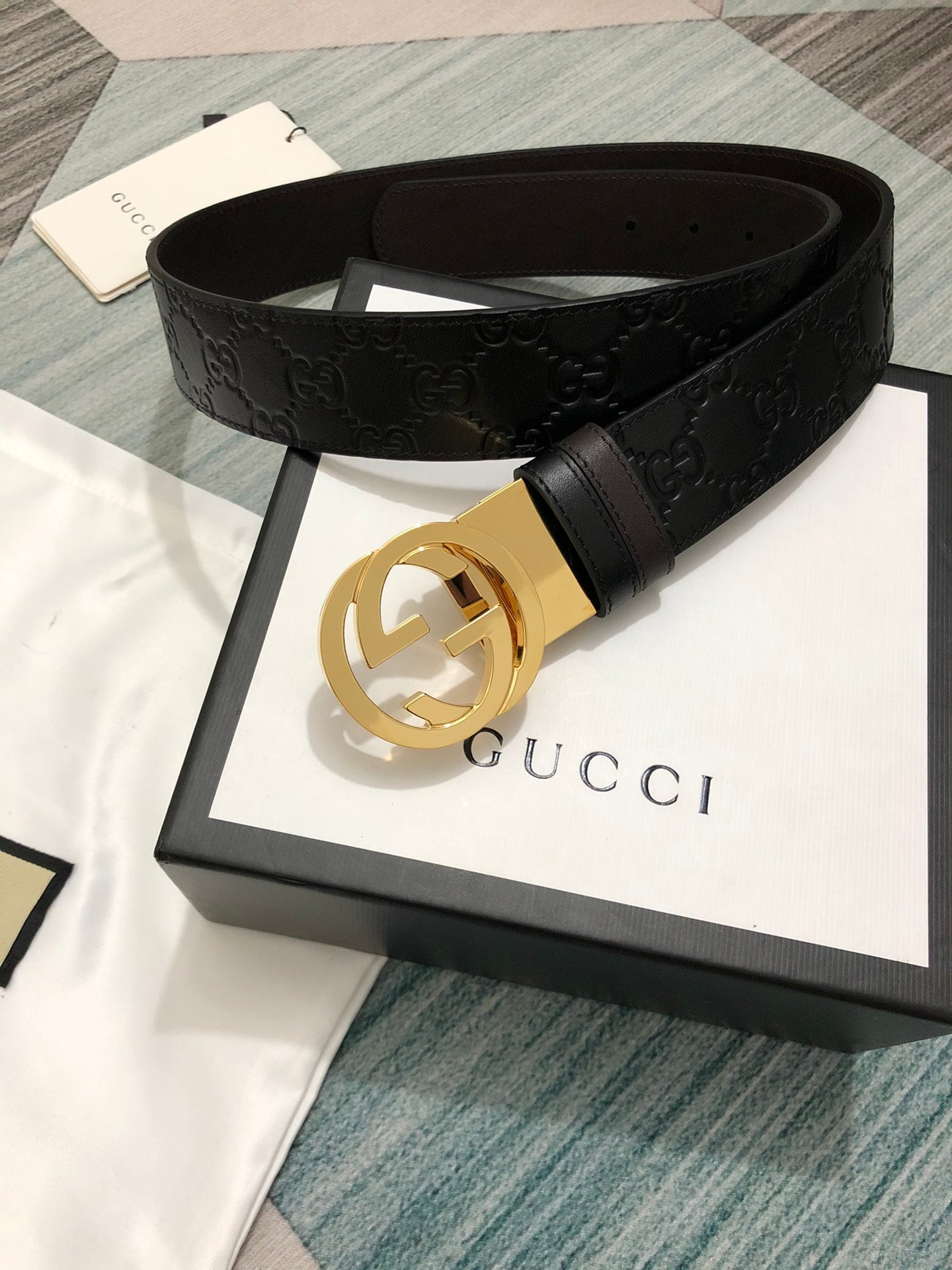 Sleek Black Leather Belt with Gold-Tone Buckle