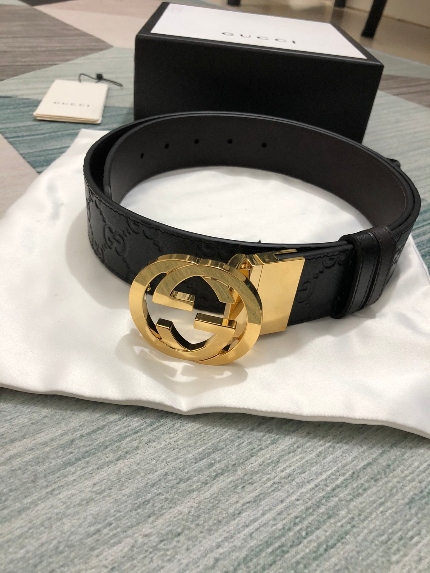 Sleek Black Leather Belt with Gold-Tone Buckle
