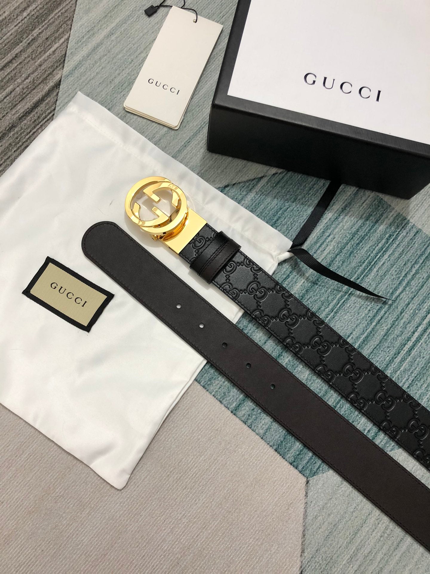 Sleek Black Leather Belt with Gold-Tone Buckle