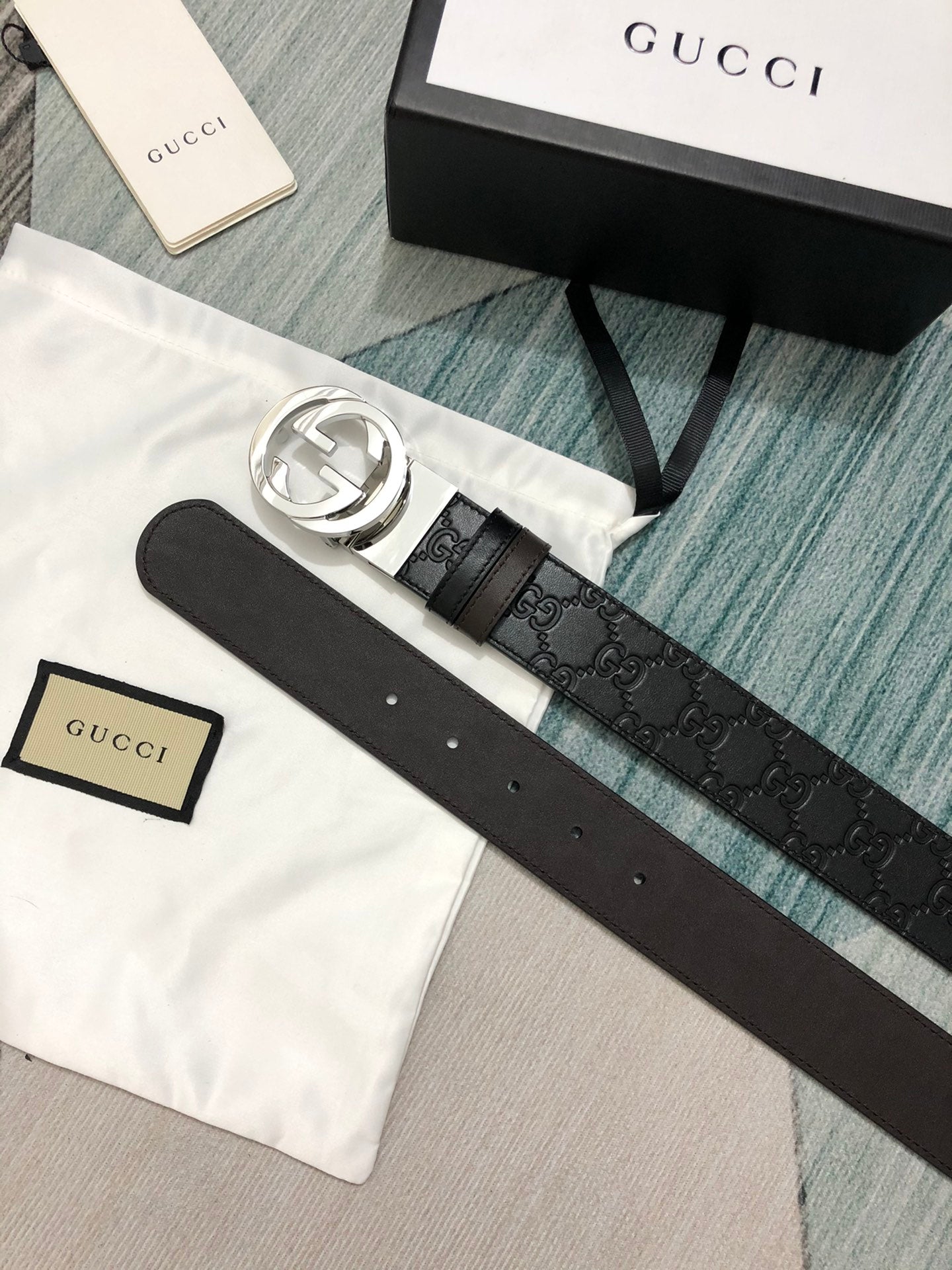 Sleek Black Leather Belt with Silver-Tone Buckle