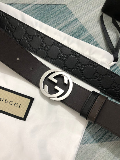 Sleek Black Leather Belt with Silver-Tone Buckle