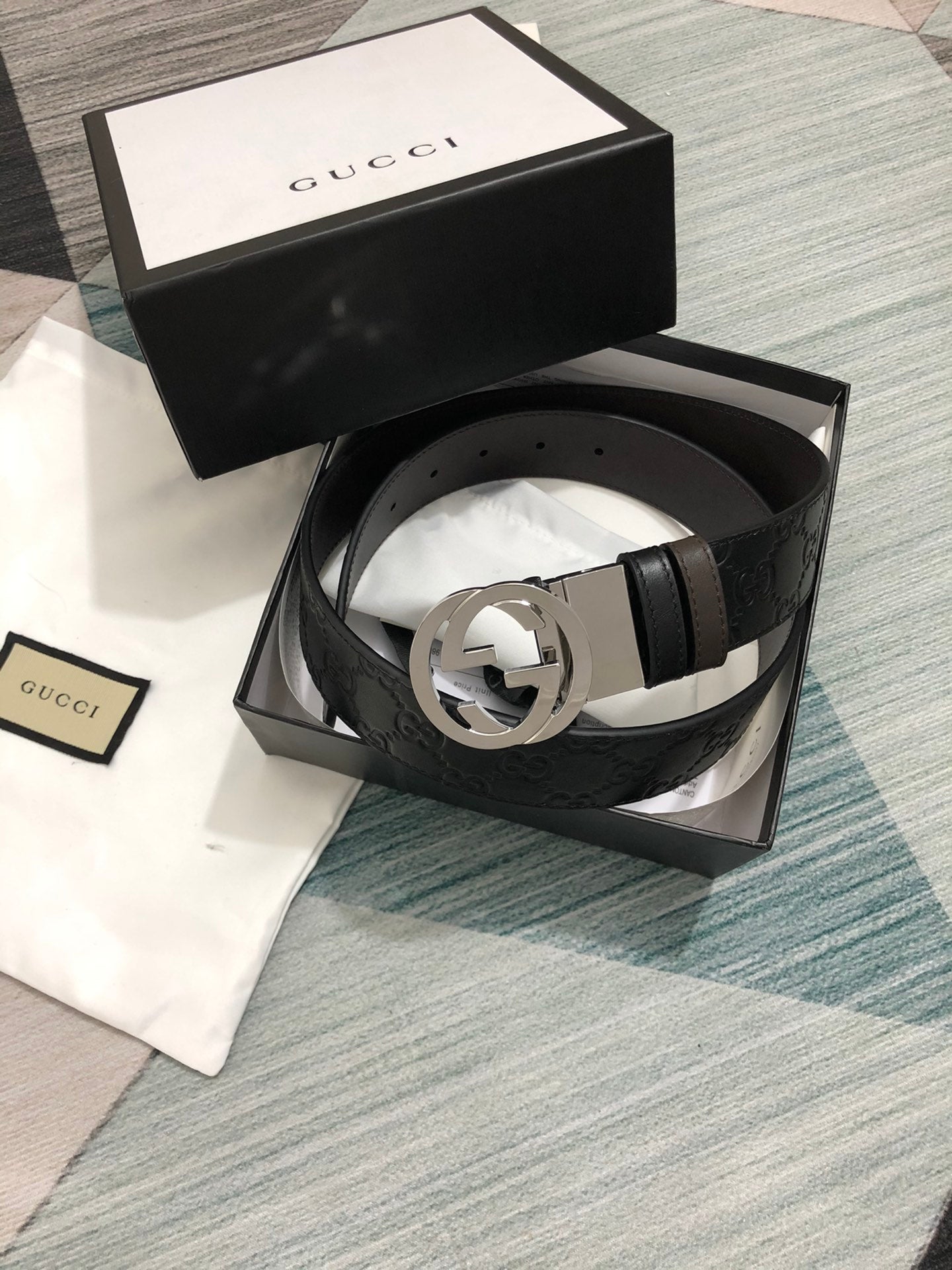 Sleek Black Leather Belt with Silver-Tone Buckle