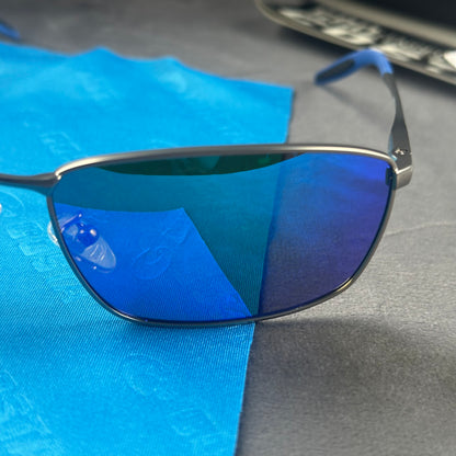 Close-up of performance polarized sunglasses with blue mirror lenses and lightweight metal frame.