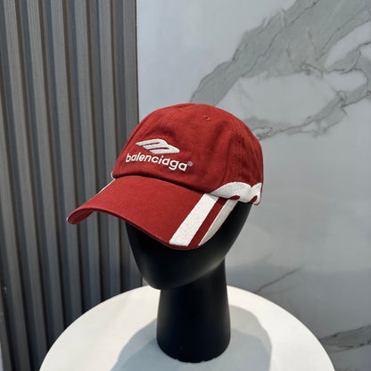 A vibrant red baseball cap featuring bold white side stripes and centered white embroidery.