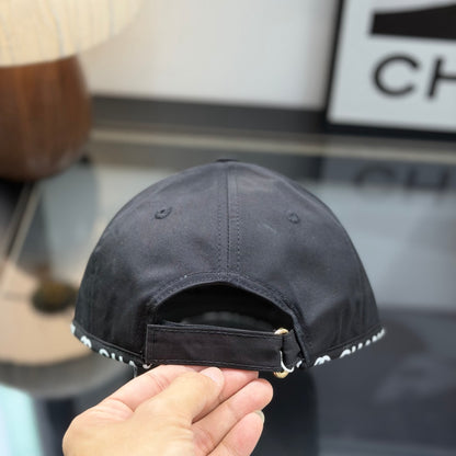 A classic black baseball cap featuring white embroidered logo, sturdy cotton blend, adjustable strap