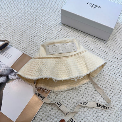 Ivory Quilted Bucket Hat with Frayed Brim and Woven Chin Strap