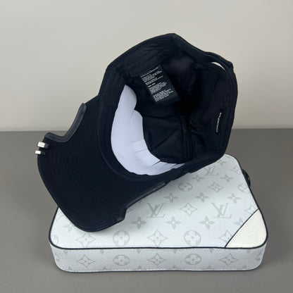 Black cotton cap with flame embroidery and notched brim