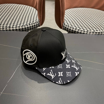 Black baseball cap featuring a raised minimalist logo and a striking geometric patterned brim.