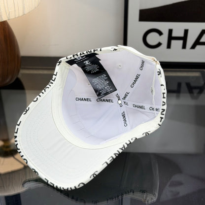A white premium baseball cap with black embroidered logo details on a clean display surface.