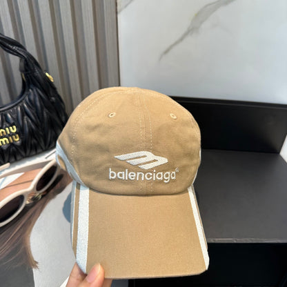 Tan cotton baseball cap with white side stripe detailing and embroidered logo on front.