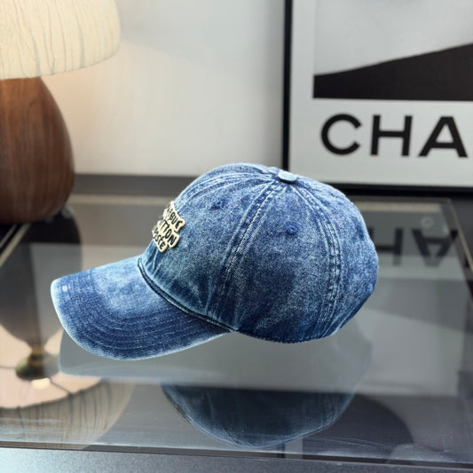 A vintage acid-washed denim baseball cap with embroidered logo detail, styled for a casual look.
