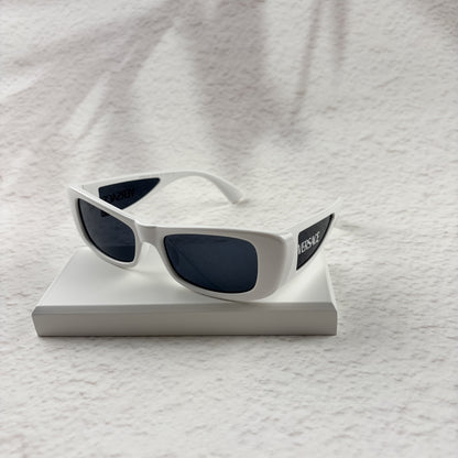 A pair of modern rectangular sunglasses with a bright white frame and dark tinted lenses.