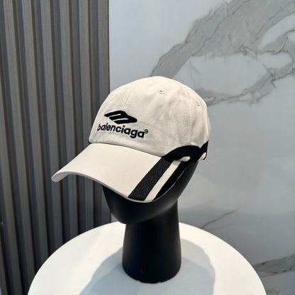 A premium white cotton baseball cap with black contrast detailing and an adjustable back strap.