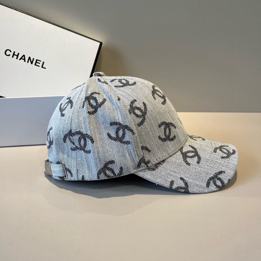 Classic monogram patterned denim baseball cap with an adjustable metallic buckle strap.