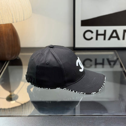 A classic black baseball cap featuring white embroidered logo, sturdy cotton blend, adjustable strap