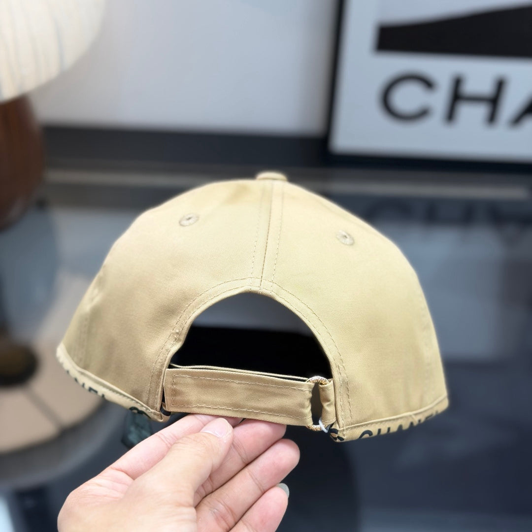 A premium structured baseball cap in a neutral beige tone featuring an embroidered central logo.
