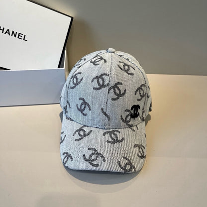 Classic monogram patterned denim baseball cap with an adjustable metallic buckle strap.