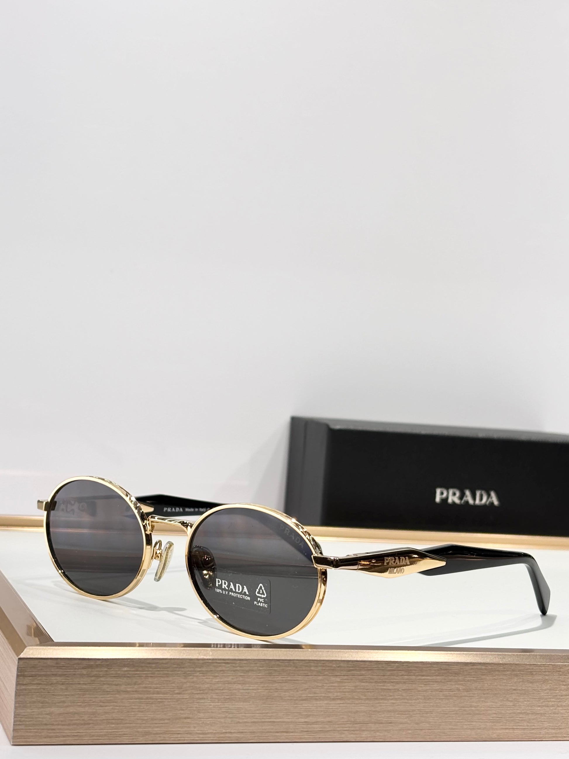 Round Gold Metal Sunglasses with Dark Lenses