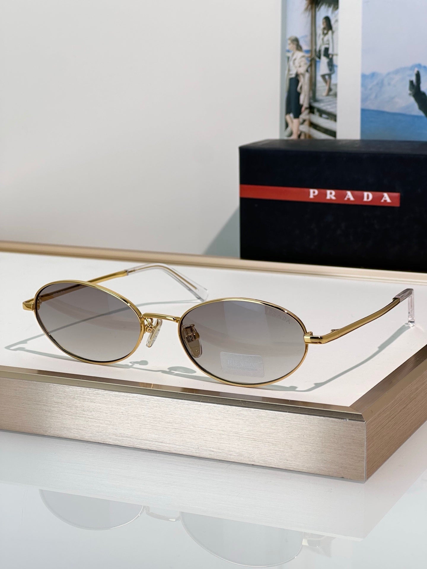 Gold Oval Rimless-Look Sunglasses with Gradient Lenses