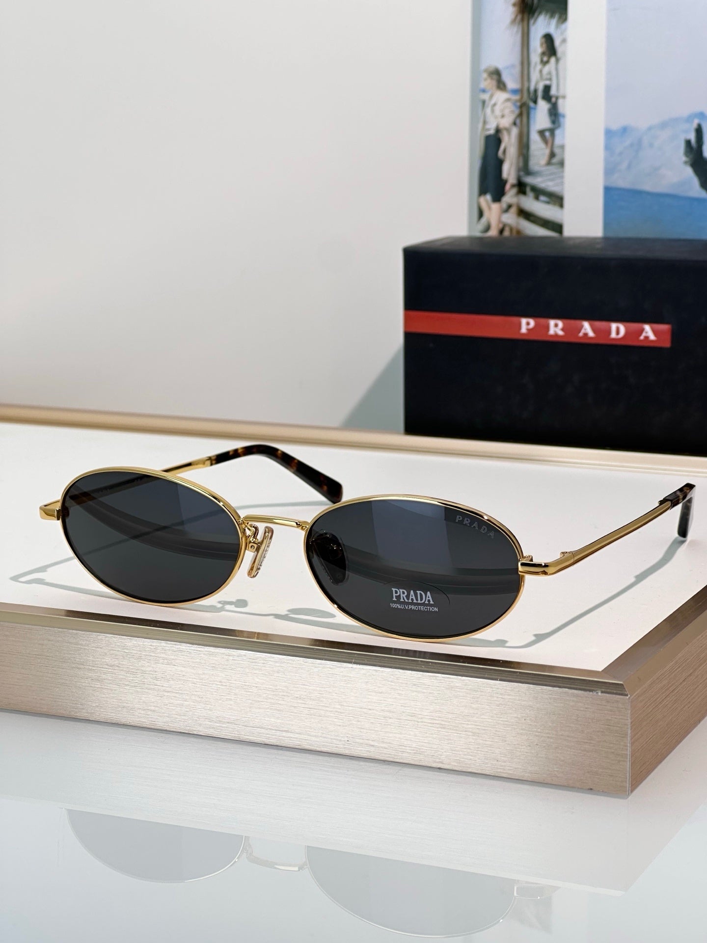 Gold Oval Metal Sunglasses with Dark Lenses