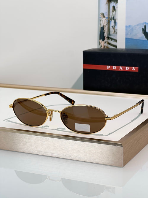 Gold Tone Oval Rimless Sunglasses with Brown Lenses