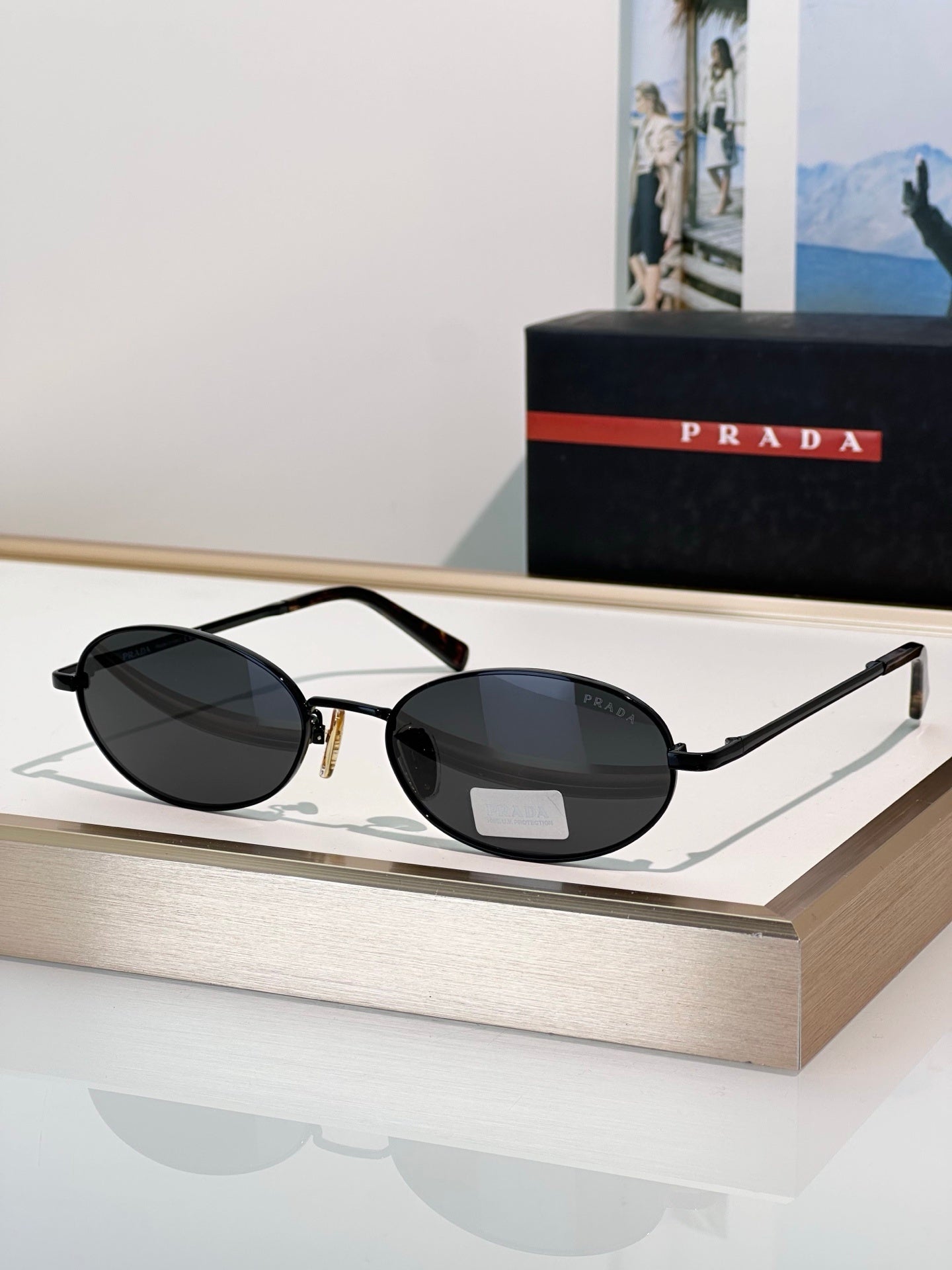 Oval Black Frame Sunglasses with Dark Lenses