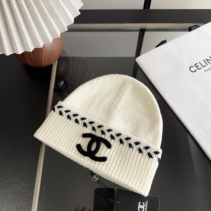 Ivory Ribbed Knit Beanie with Black Stitch Detail