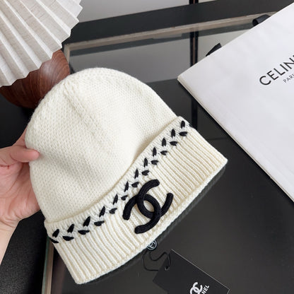 Ivory Ribbed Knit Beanie with Black Stitch Detail
